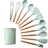 

Eco Friendly Wholesale New Product Nonstick Cookware 11 pcs Wooden Handle Silicone Cooking Utensil set Kitchen Accessories