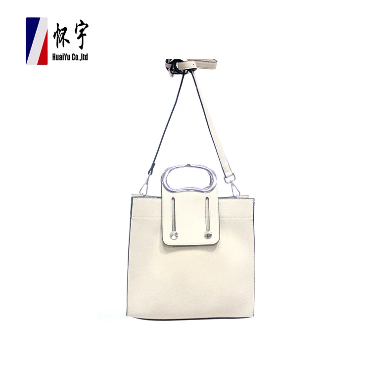 white shoulder strap purse