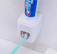 

plastic cheap automatic toothpaste dispenser Toothpaste squeezer