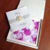 Innovative luxury paper wedding invitation box with diamonds and petals