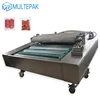 High Quality DZ-1000 Computer Operated Belt Type Vacuum Packaging Machine For Food With Little Juice