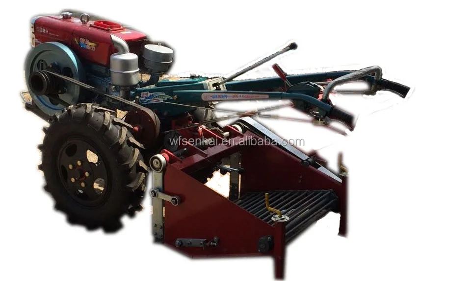 potato harvester mounted to 101 tractor01.jpg