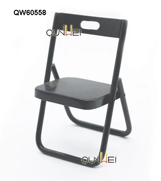 black fold away table and chairs