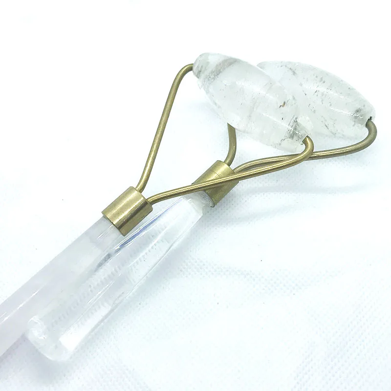 

Natural hot selling single head white crystal facial massage roller