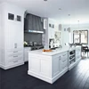 Modern L shaped kitchen pantry cupboards with dining table