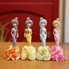 Cartoon flower skirt is lovely fashionable girl places resin to place an article