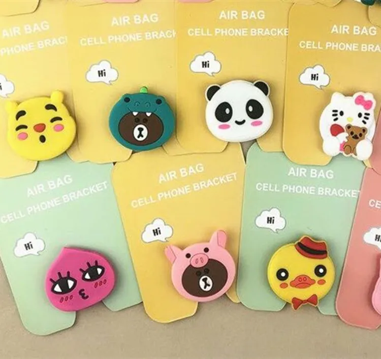 

Wholesale free custom Pops Phone Socket mobile stand holder for cell phone
