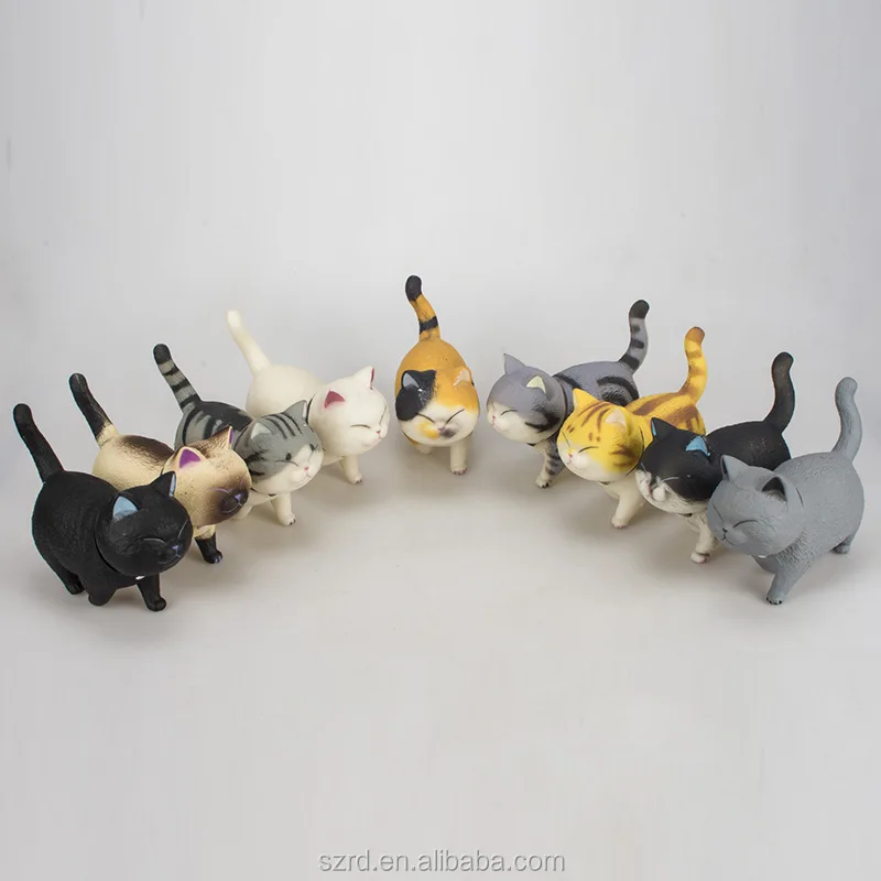 small plastic cats