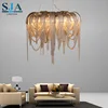 Postmodern luxury shadow arched aluminum stream macrame modern chrome chandelier lamp