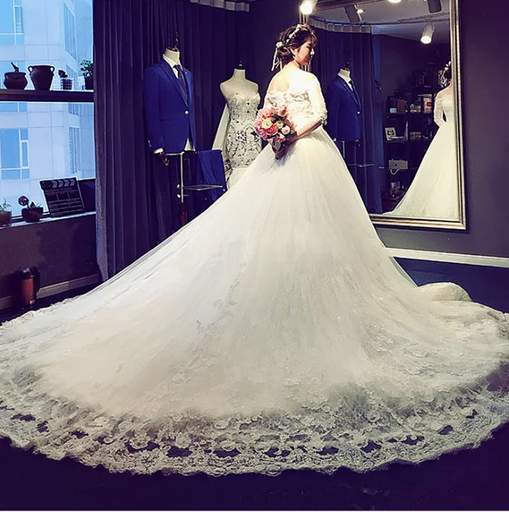 ZH2513 Gorgeous Long Train A Line Tulles Wedding Dresses Lace Appliques Slash Neckline Three Quarter Sleeves Bridal Gown