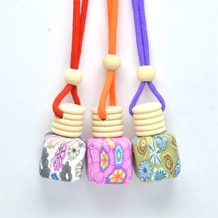 

Wholesale wooden hanging 10ml car perfume bottle in stock