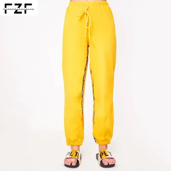 yellow jogging pants