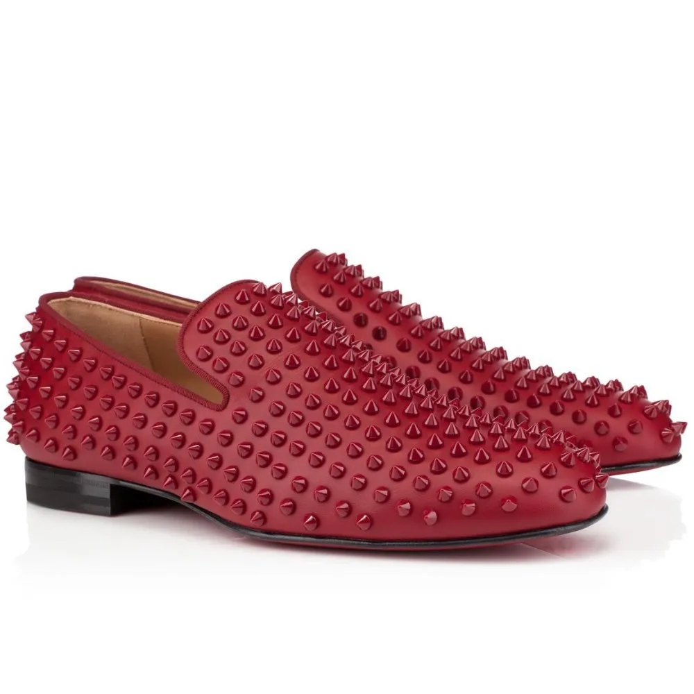 red loafers with gold spikes