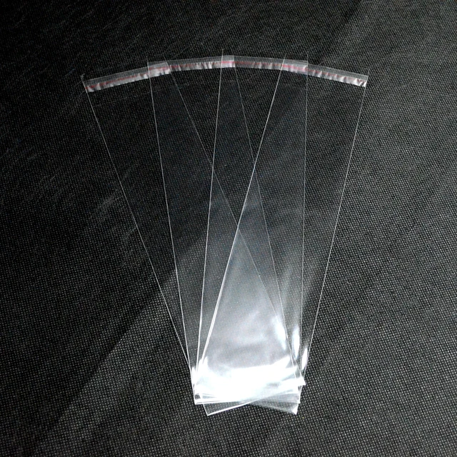 clear opp bag with adhesive strip with header plastic bags