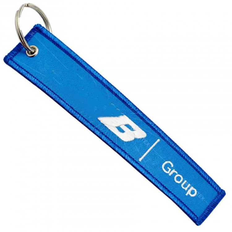 
New design low MOQ custom logo Embroidered keychain keyring 