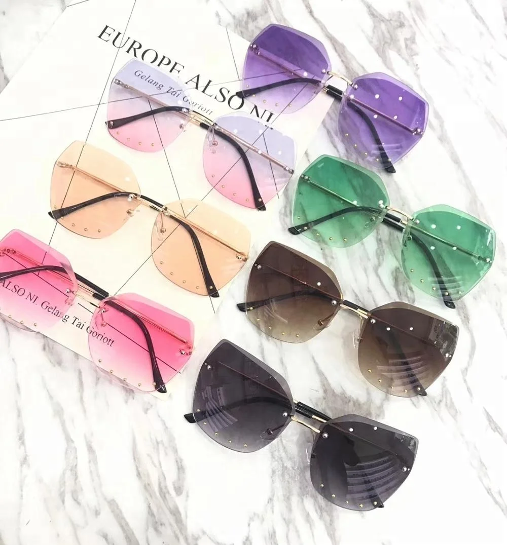 

Frameless Sun glasses Irregular Rimless Lens Women Sunglasses