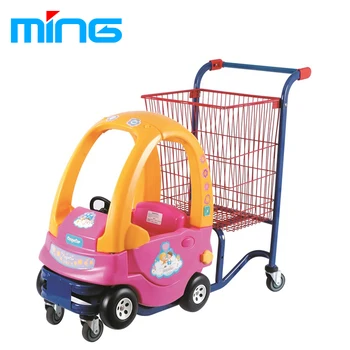 child in shopping trolley