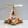 Christmas wooden pyramid with hand-painted nativity figurines with turning wings with 3 candleholders