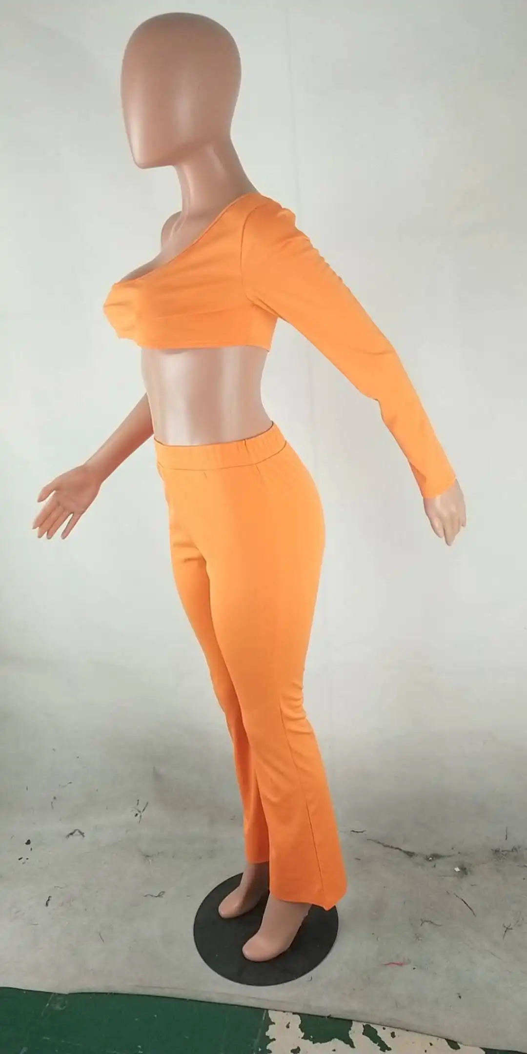 Sexy orange solid one shoulder crop top and wide leg pants asymmetry sleeves women two piece set