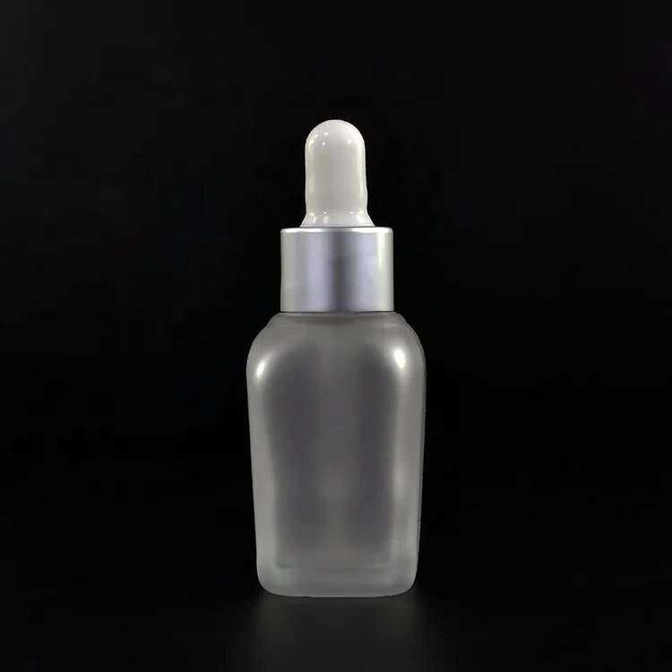 
Fancy square 15ml 20ml 30ml 50ml 100ml 30 ml clear frosted clear perfume glass dropper bottle with gold hollow caps 