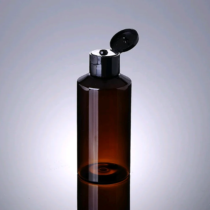 

PET amber cosmetic packaging plastic bottles with flip top cap