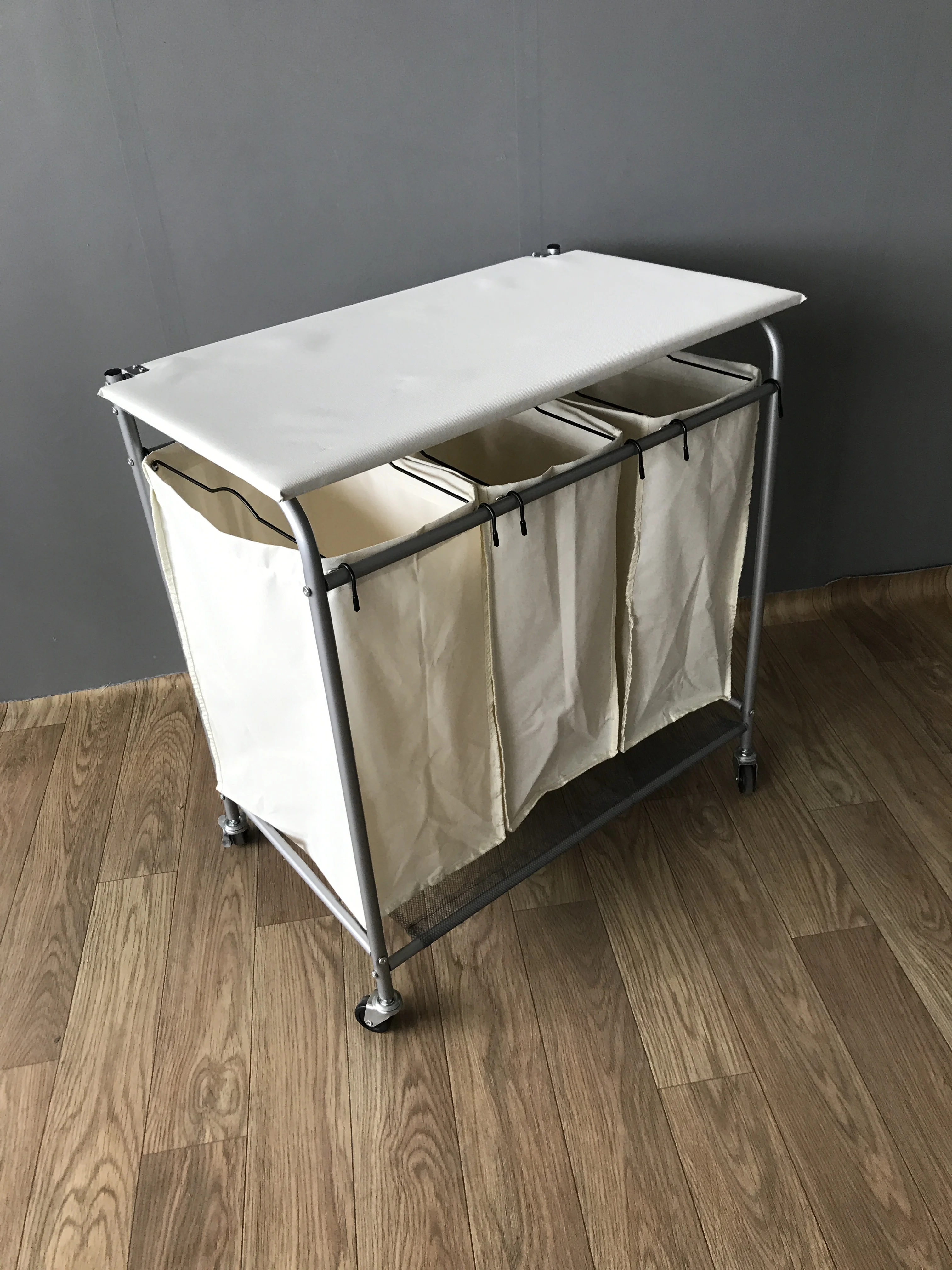 Best Selling 3 Bag Rolling Laundry Cart With Ironing Board Table