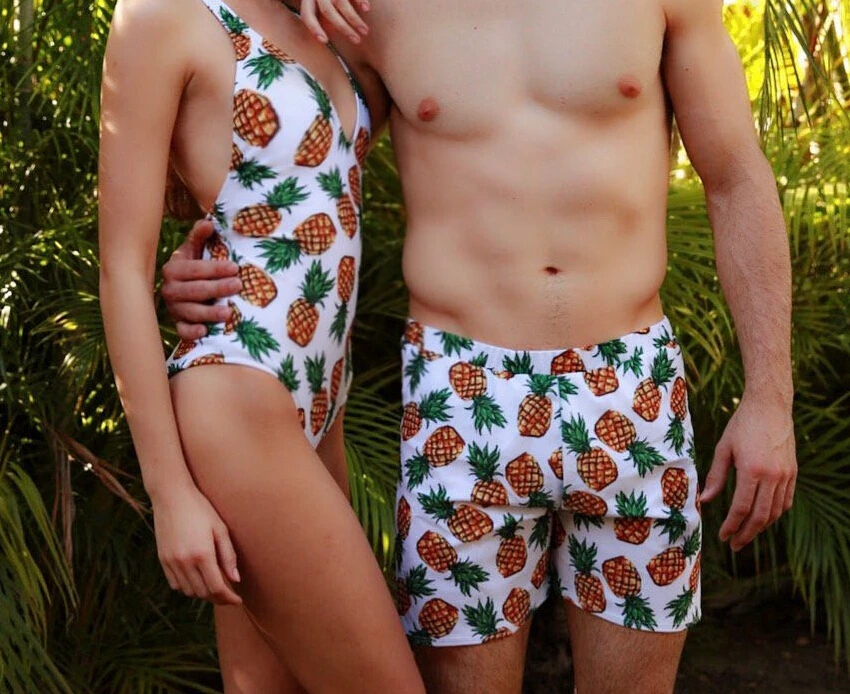 man and woman matching swimsuits