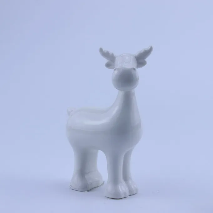 white ceramic reindeer figurine