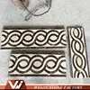 Arced weave simple pattern wall and floor border design