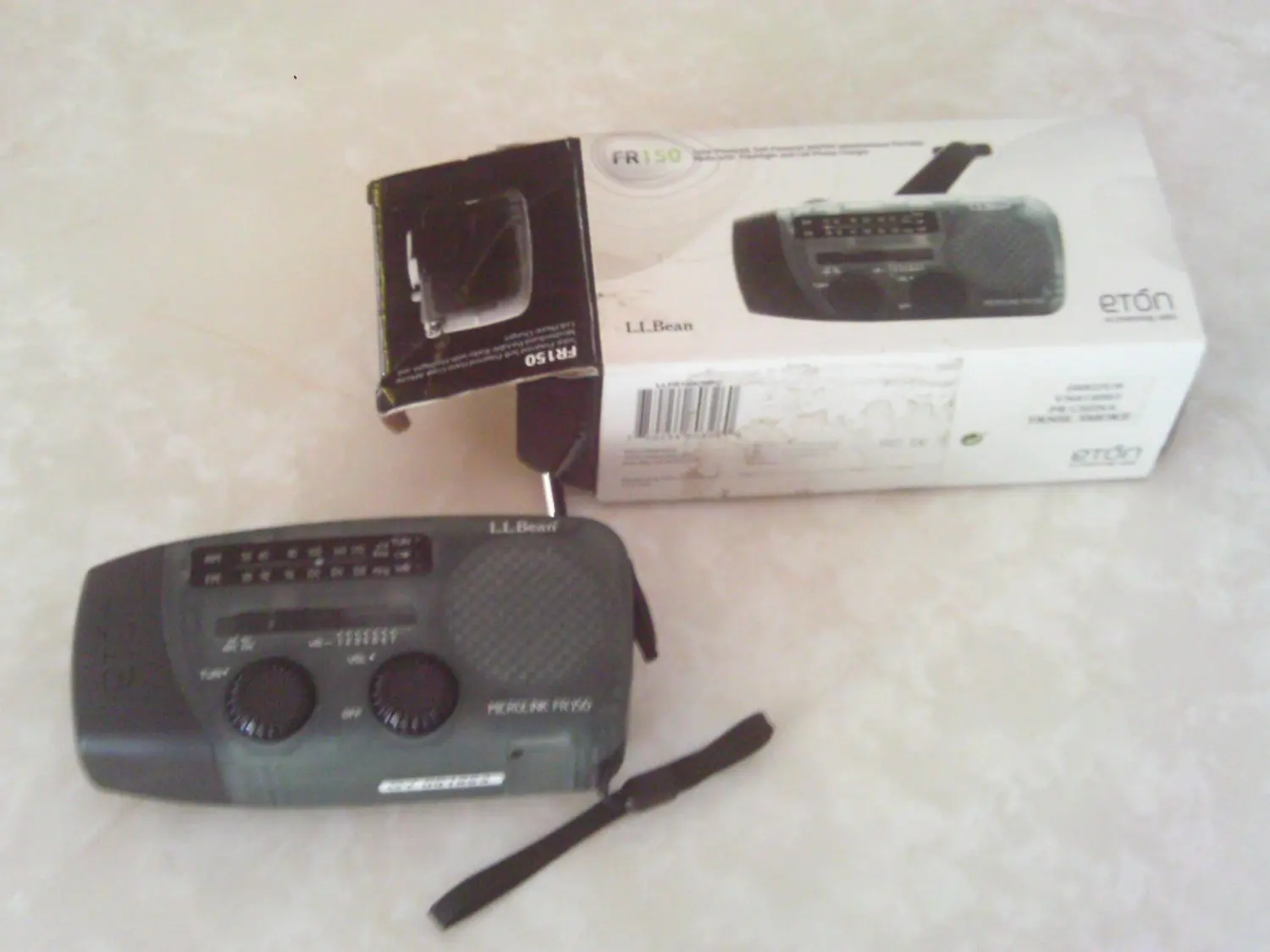 Eton FR150 Microlink Solar-Powered, Self-Powered AM/FM/Weatherband Portable  Radio with Flashlight and Cell Phone Charger, Transparent Smoke color