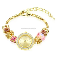 

fancy design gold snake chain bracelet lady watch with flower beads pendant