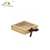 Custom brown kraft paper box with clear PVC window for tea light packaging