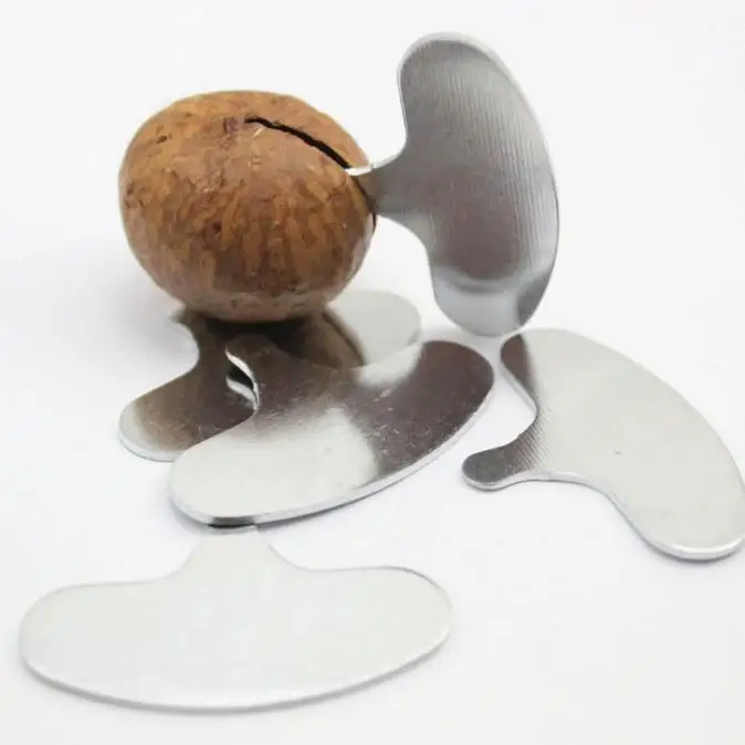 

Portable Nut Cracker Sheller Walnuts MACADAMIA NUTS Metal Key Opener New Nut Device Kitchen Tool, Sliver