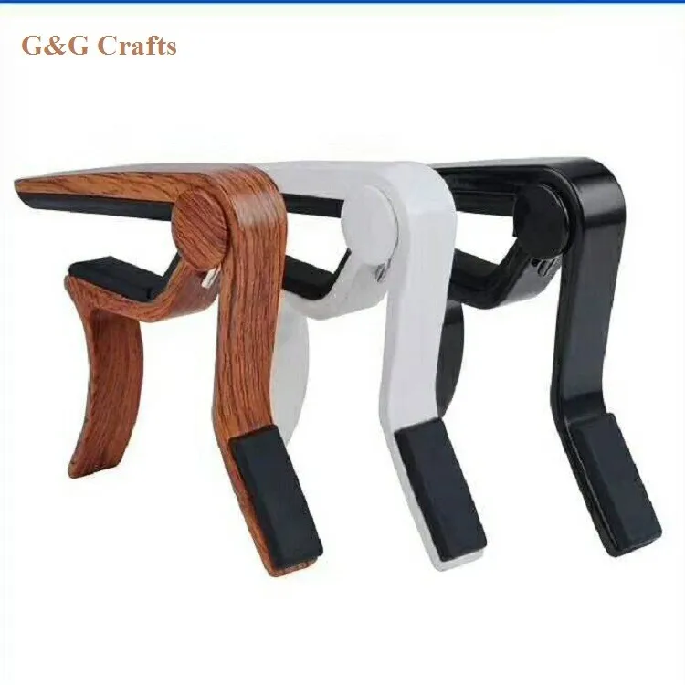 

Customized Musical Instrument Accessories Guitar Capo Wood Acoustic Guitar Capo, Brown/white/black