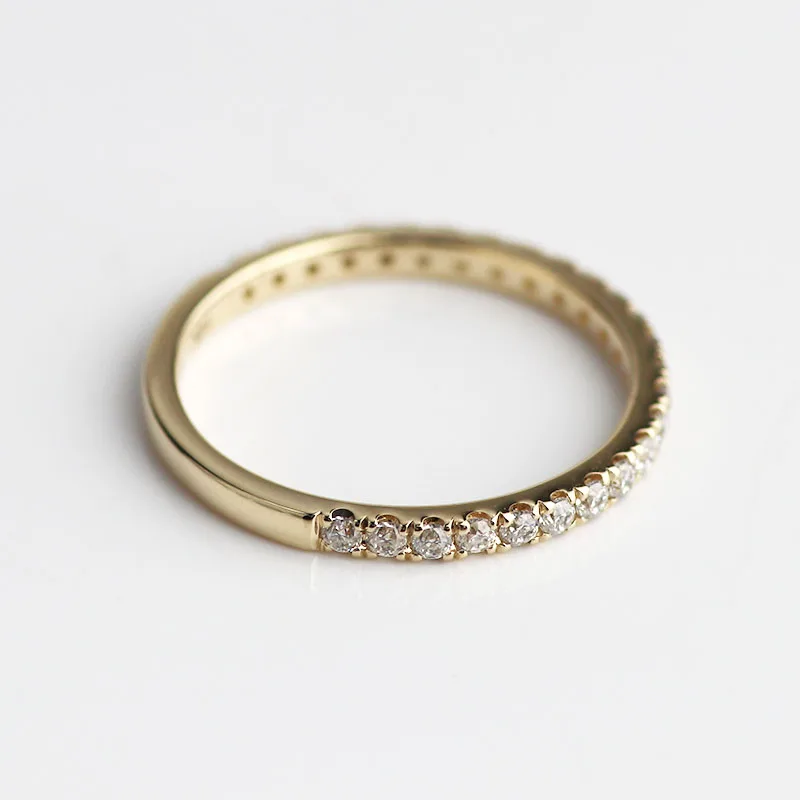 

14k yellow gold half eternity moissanite band for engagement ring with melee moissanite