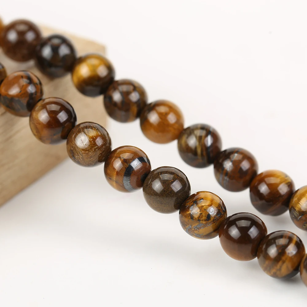 

China factory yiwu cheap price tiger stone beads loose beads