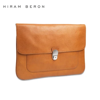 tan leather clutch bag