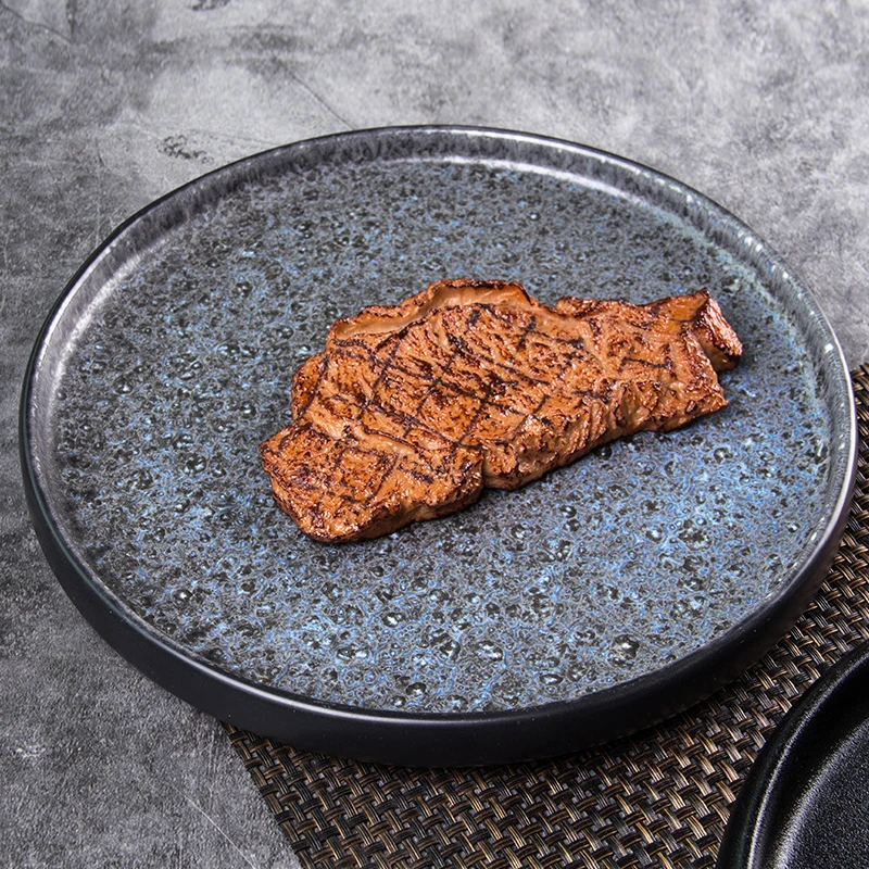 

Dehua factory stocked high quality porcelain tray ceramic flat round black matte plates no min order, Customized