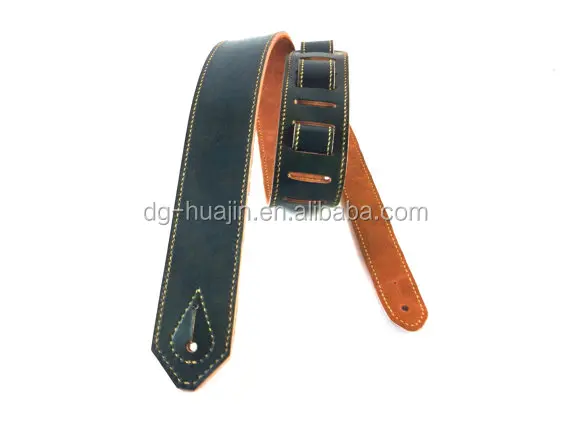 

Black Leather guitar strap, adjustable with suede fabric backing for sale