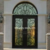 Wrought iron entry door, separate round transom, thermos break included