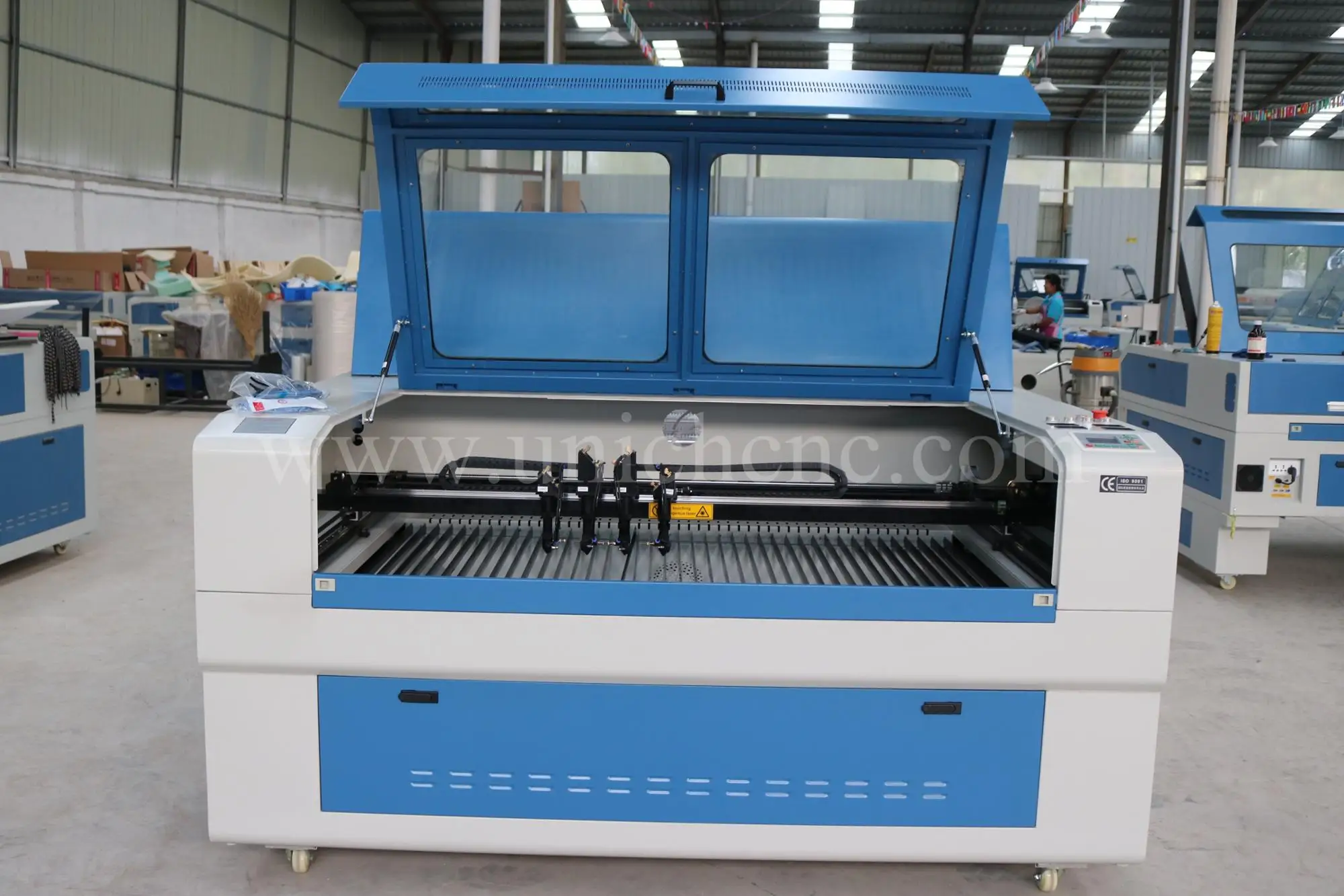 2016 UNICHCNC high precision cnc engraver cutter/four laser heads/fabric laser cutting machine