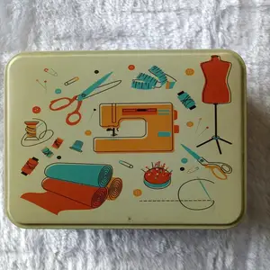 Image of Portable Travel Sewing Kit in Tinplate Storage Box of Sewing Basket