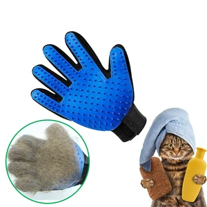 Image of Pet's left and right hand grooming gloves Remove the brush Clean pet hair
