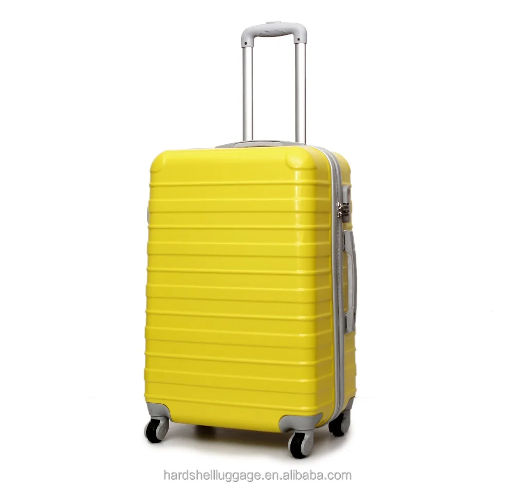 yellow hard case suitcase