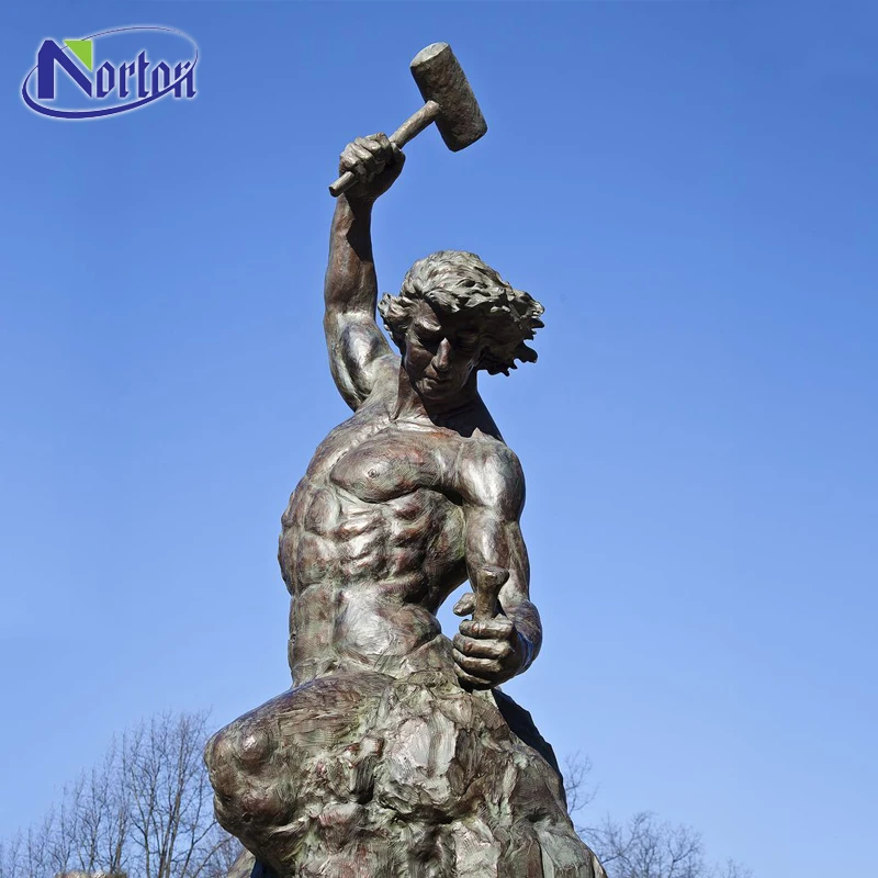 statue of a nude man in italy in a piazza near leaning tower of pizza