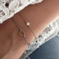 

Zooying Hollow Heart Pearl bead String bracelet