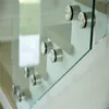 Solid wood box precast floating staircase with standoff glass railing