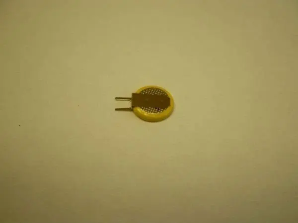 CR1220 battery with pins