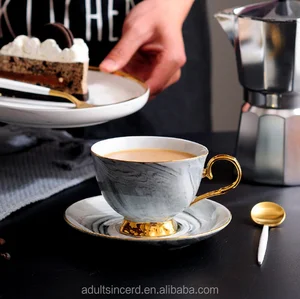 Image of New Design Marble white porcelain Coffee Gold line With Handle Personalized Tea Cups and Saucers