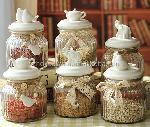 

Glass food storage jar with ceramic animal shape lid